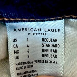 American Eagle skinny stretch jeans. Covered rips. Size 4